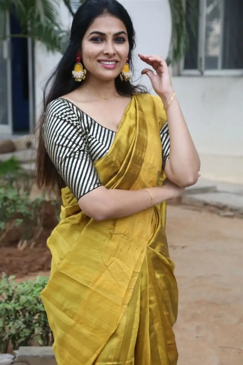 ACTRESS DIVI VADTHYA IN YELLOW SAREE AT LAMBASINGI MOVIE MEET 14